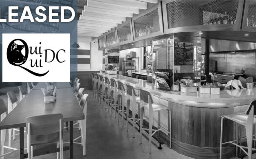 Interior of the newly leased restaurant space at 3227 Georgia Avenue NW in Washington DC, featuring modern bar seating and signage for Qui Qui DC.