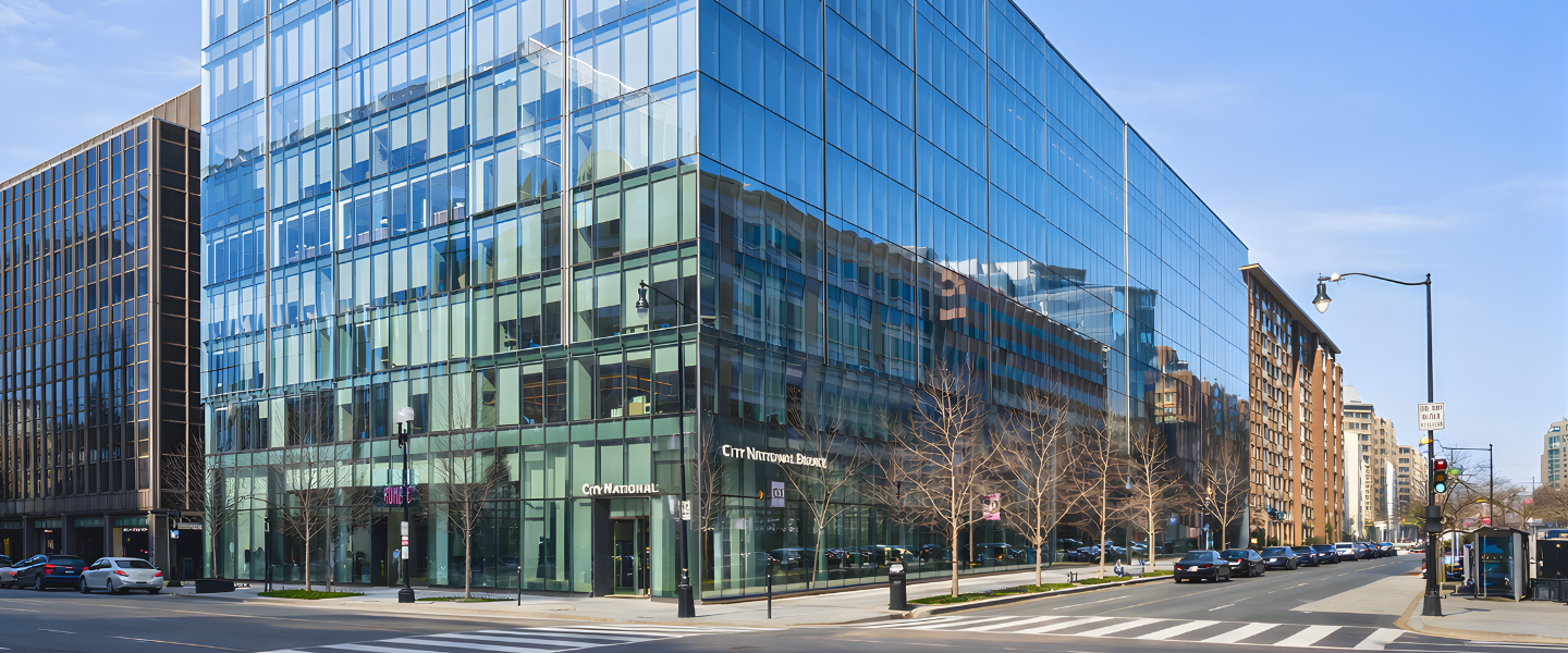 Exterior photo of 2001 M Street NW in Washington DC showing the Class A office building and corner retail frontage.
