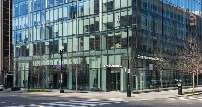 Thumbnail of Exterior photo of 2001 M Street NW in Washington DC showing the Class A office building and corner retail frontage.