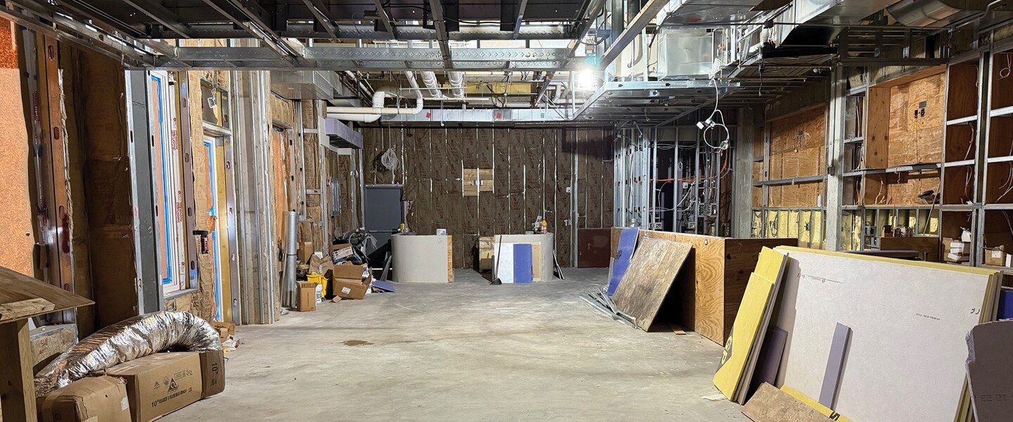 Second interior view showing the open layout of the Georgia Avenue retail space